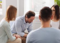 Group of young people sitting in the circle adult therapy